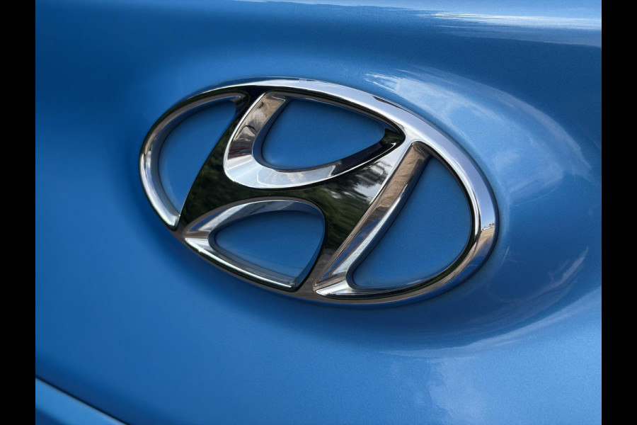 Hyundai Kona 1.0T Essence 2e Eigenaar,Trekhaak,Camera,Carplay,Navi,Clima,Cruise,6 Bak,N.A.P,120pk,Lm velgen,Rijstrooksensor,Pdc,Apk tot 03-2027