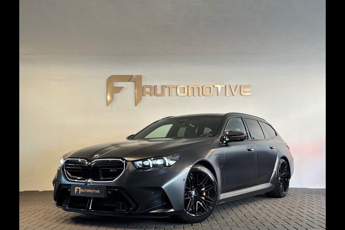 BMW 5 Serie Touring M5 Pano|Keramisch|B&W|HuD|Carbon|M Drivers
