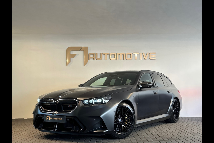 BMW 5 Serie Touring M5 Pano|Keramisch|B&W|HuD|Carbon|M Drivers