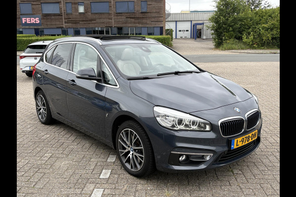 BMW 2 Serie Active Tourer 225xe iPerformance High Executive | PHEV | Panoramadak | Stoelverwarming | Leder | Head-Up | Navi