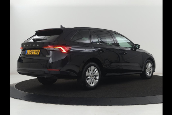 Škoda Octavia Combi 1.0 e-TSI Business Edition | Cruise control | Park assist | Carplay | LED | Cruise control | Park assist | Carplay | Full LED | Climate control | Virtual Dashboard | DAB | Getint glas