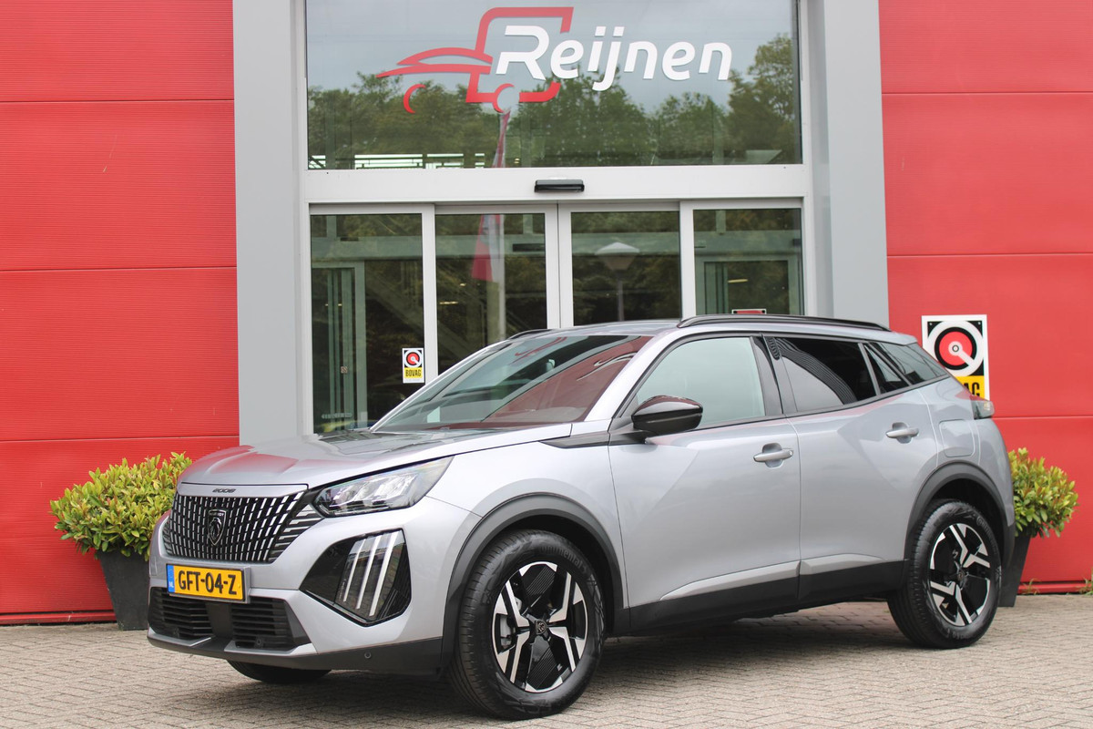 Peugeot 2008 1.2 100PK ALLURE | ACHTERUITRIJ CAMERA | NAVIGATIE | DRAADLOZE APPLE CARPLAY/ANDROID AUTO | PARKEERSENSOREN VOOR + ACHTER | CRUISE CONTROL | DAB+ RADIO | CLIMATE CONTROL | 17" LICHTMETALEN VELGEN | UNIEKE KM STAND! |