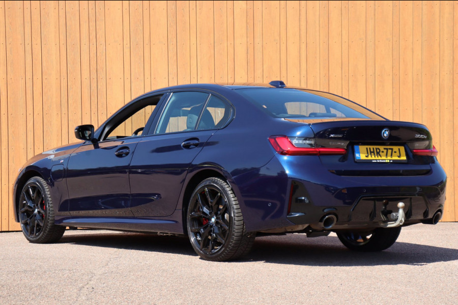 BMW 3-serie 330e xDrive Tansanitblau HUD ambiance verl M-Sport Pro leer+vw stuurverw el.klep camera's