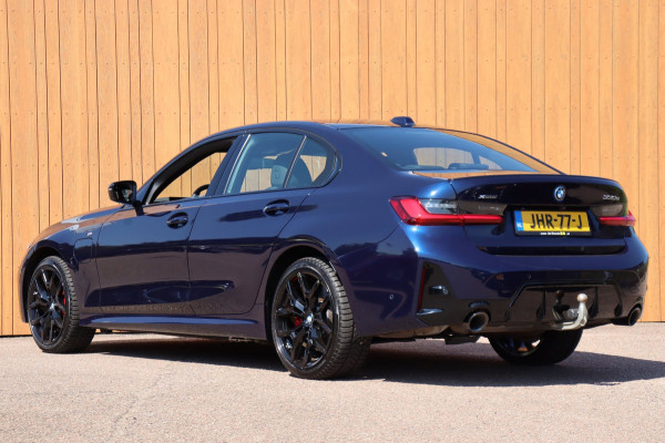BMW 3-serie 330e xDrive Tansanitblau HUD ambiance verl M-Sport Pro leer+vw stuurverw el.klep camera's