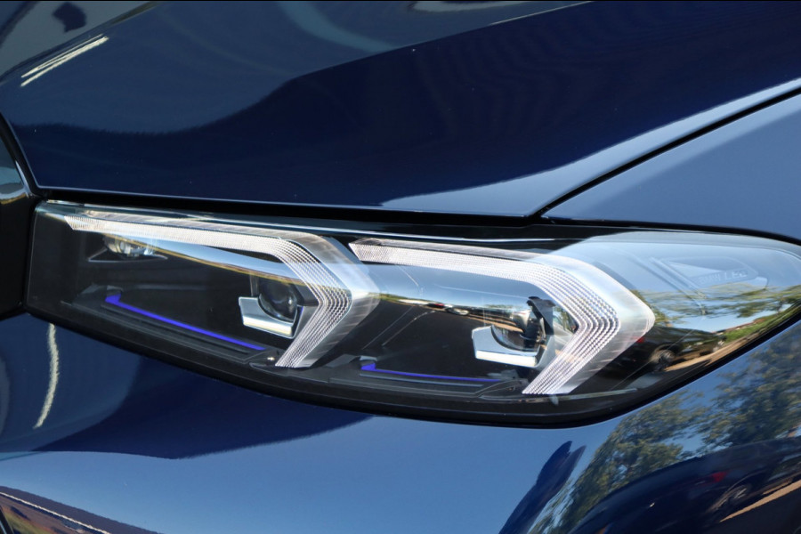 BMW 3-serie 330e xDrive Tansanitblau HUD ambiance verl M-Sport Pro leer+vw stuurverw el.klep camera's