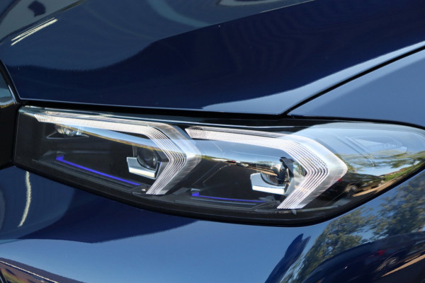 BMW 3-serie 330e xDrive Tansanitblau HUD ambiance verl M-Sport Pro leer+vw stuurverw el.klep camera's