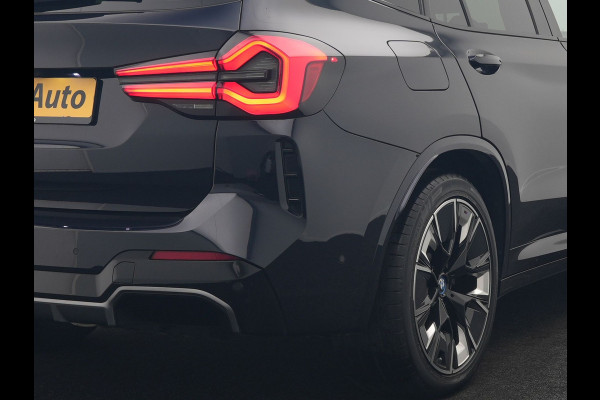 BMW iX3 M Sport High Executive 80 kWh 286pk Dealer O.H. SOH 95% | Trekhaak Af Fabriek | Panodak | Head Up | 360 Camera | Harman / Kardon | Lederen Sportstoelen Memory & Verwarmd | Keyless | Blis | Sfeerverlichting | 20"L.M | Adaptive LED |