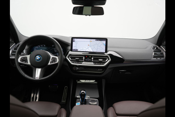 BMW iX3 M Sport High Executive 80 kWh 286pk Dealer O.H. SOH 95% | Trekhaak Af Fabriek | Panodak | Head Up | 360 Camera | Harman / Kardon | Lederen Sportstoelen Memory & Verwarmd | Keyless | Blis | Sfeerverlichting | 20"L.M | Adaptive LED |