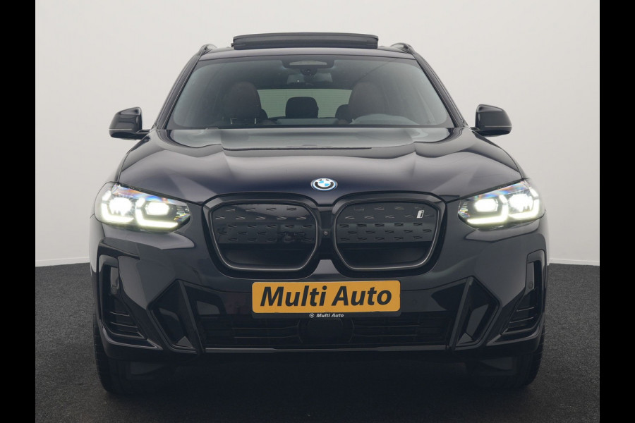 BMW iX3 M Sport High Executive 80 kWh 286pk Dealer O.H. SOH 95% | Trekhaak Af Fabriek | Panodak | Head Up | 360 Camera | Harman / Kardon | Lederen Sportstoelen Memory & Verwarmd | Keyless | Blis | Sfeerverlichting | 20"L.M | Adaptive LED |