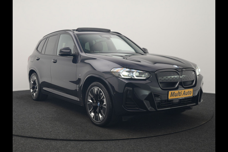 BMW iX3 M Sport High Executive 80 kWh 286pk Dealer O.H. SOH 95% | Trekhaak Af Fabriek | Panodak | Head Up | 360 Camera | Harman / Kardon | Lederen Sportstoelen Memory & Verwarmd | Keyless | Blis | Sfeerverlichting | 20"L.M | Adaptive LED |