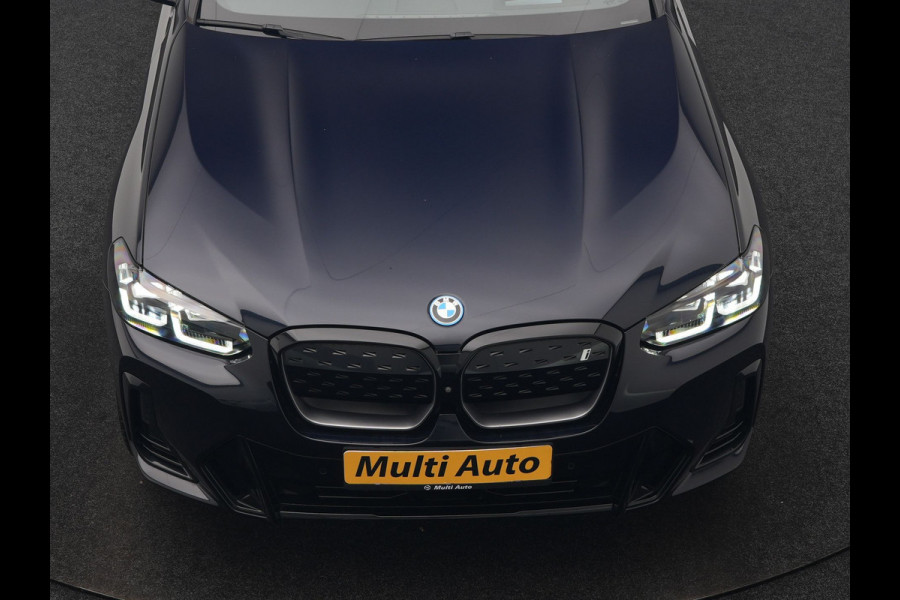 BMW iX3 M Sport High Executive 80 kWh 286pk Dealer O.H. SOH 95% | Trekhaak Af Fabriek | Panodak | Head Up | 360 Camera | Harman / Kardon | Lederen Sportstoelen Memory & Verwarmd | Keyless | Blis | Sfeerverlichting | 20"L.M | Adaptive LED |