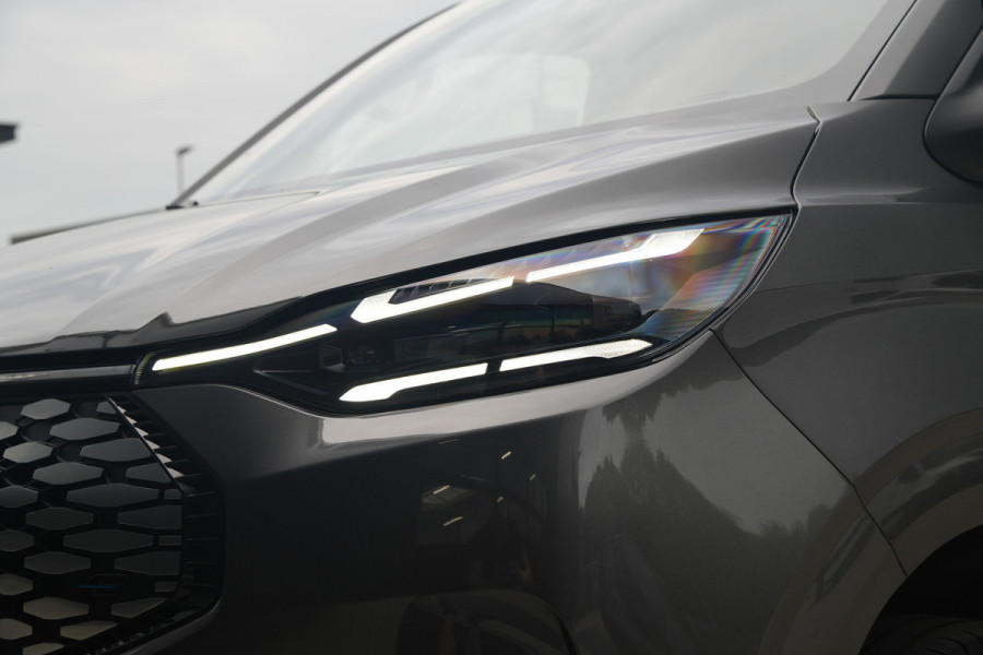 Ford E-Transit Custom 340 L2H1 Limited 71 kWh 218pk - AGR Bestuurdersstoel - Trekhaak - ACC - B&O - Navi - Stoel/Stuurverwarming - 360 Camera - Blinds