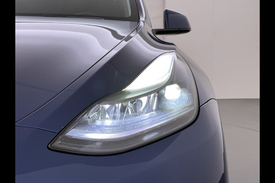 Tesla Model Y RWD 300PK LFP Accu Trekhaak Spoiler 20"lm Warmtepomp Leer PanoDak Navi Premium-Audio Ecc Adap.Cruise Camera's Traffic-Aware-Cruise+Sturen  AI FSD-3 Computer SOH 92% Stuur+Stoelverwarming Led Traffic-Aware Cruise Control Toybox Elek.Achterklep 1.600KG Trekgewicht 1e Eigenaar Origineel Nederlandse Auto