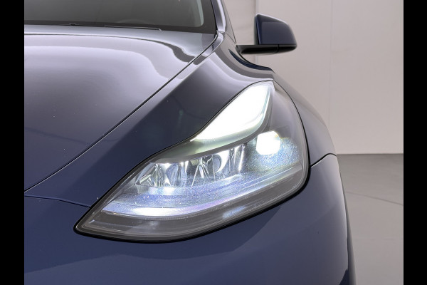 Tesla Model Y RWD 300PK LFP Accu Trekhaak Spoiler 20"lm Warmtepomp Leer PanoDak Navi Premium-Audio Ecc Adap.Cruise Camera's Traffic-Aware-Cruise+Sturen  AI FSD-3 Computer SOH 92% Stuur+Stoelverwarming Led Traffic-Aware Cruise Control Toybox Elek.Achterklep 1.600KG Trekgewicht 1e Eigenaar Origineel Nederlandse Auto