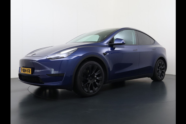 Tesla Model Y RWD 300PK LFP Accu Trekhaak Spoiler 20"lm Warmtepomp Leer PanoDak Navi Premium-Audio Ecc Adap.Cruise Camera's Traffic-Aware-Cruise+Sturen  AI FSD-3 Computer SOH 92% Stuur+Stoelverwarming Led Traffic-Aware Cruise Control Toybox Elek.Achterklep 1.600KG Trekgewicht 1e Eigenaar Origineel Nederlandse Auto