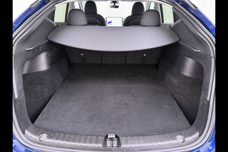 Tesla Model Y RWD 300PK LFP Accu Trekhaak Spoiler 20"lm Warmtepomp Leer PanoDak Navi Premium-Audio Ecc Adap.Cruise Camera's Traffic-Aware-Cruise+Sturen  AI FSD-3 Computer SOH 92% Stuur+Stoelverwarming Led Traffic-Aware Cruise Control Toybox Elek.Achterklep 1.600KG Trekgewicht 1e Eigenaar Origineel Nederlandse Auto
