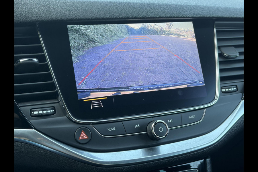Opel Astra 1.2 Launch Elegance 2e Eigenaar,Camera,Stoelverw-Stuurverw,110pk,Navi,Carplay,Halfleder,Elekt.Stoel,6 Bak,Clima,Cruise,Lm velgen,Pdc V+A,N.A.P,Net beurt gehad,Apk tot 09-2028