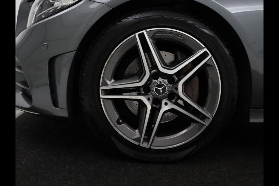 Mercedes-Benz C-Klasse 160 AMG Limited | Stoelverwarming | Leder/Alcant. | Trekhaak | Camera | Park Assist | Navigatie | Digitale Cockpit | Climate control | Cruise control | 18'' | Bluetooth