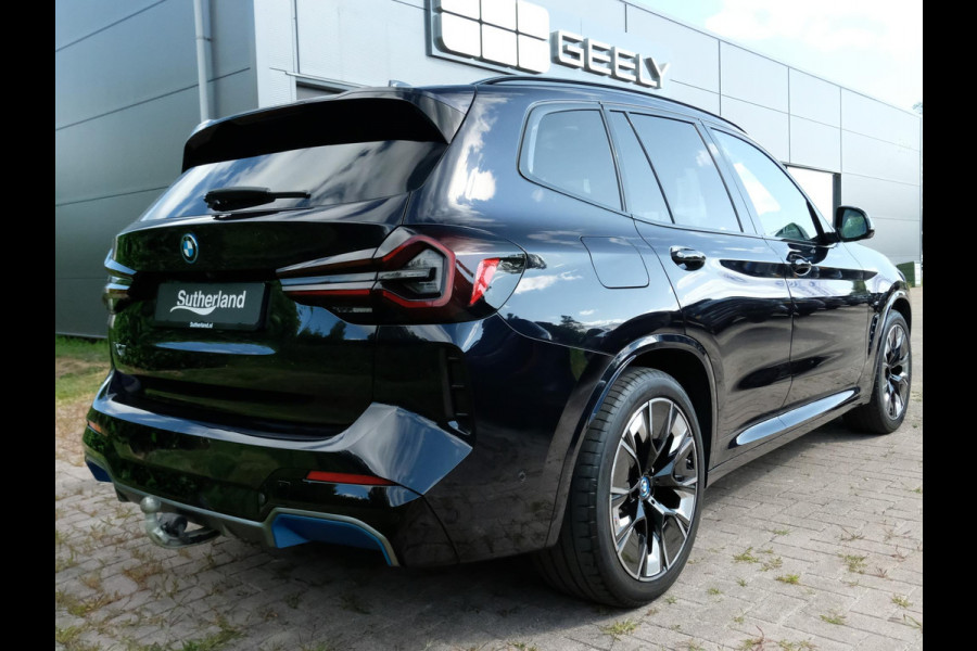 BMW iX3 High Executive 80 kWh | M Sport | Panoramadak | Trekhaak wegklapbaar | Harman/kardon | Keyless entry | Sportstoelen | Stoelverwarming | 360 graden camera | Head Up Display