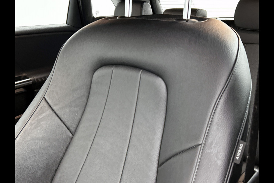 Mercedes-Benz B-Klasse 180 Business Solution Luxury Trekhaak | Parkeerpakket met achteruitrijcamera | Ledkoplampen | Sfeerverlichting | Stoelverwarming. Inclusief 24 maanden MB Certified garantie voor Europa.