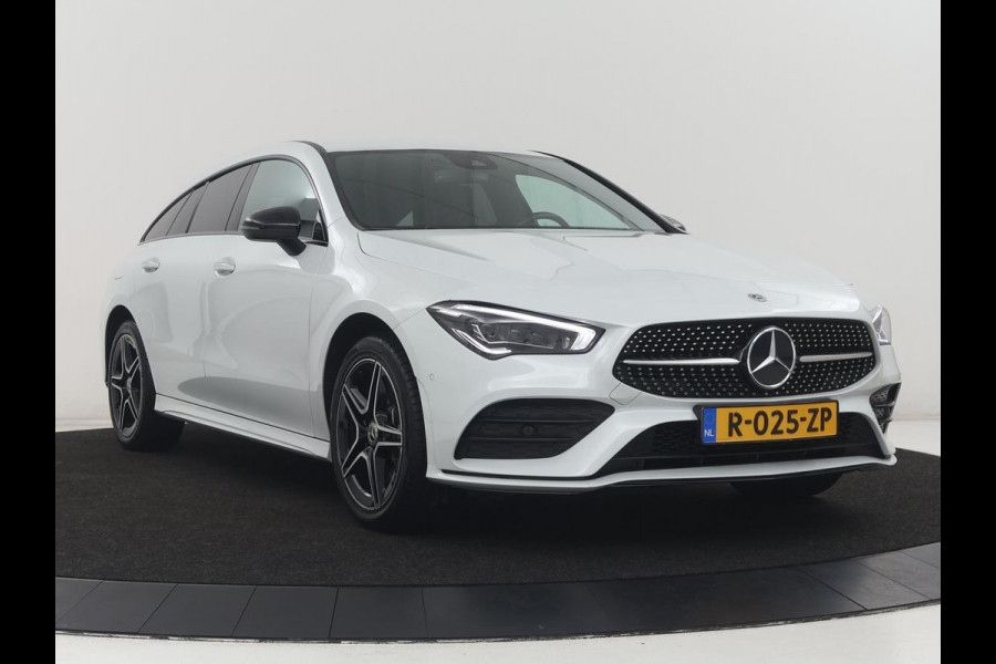 Mercedes-Benz CLA-Klasse Shooting Brake 250 e AMG Line | SOH 92.9% | Trekhaak | Leder | Camera | Carplay | Park assist | Cruise control | Sfeerverlichting | Stoelverwarming | Full LED | Climate control |