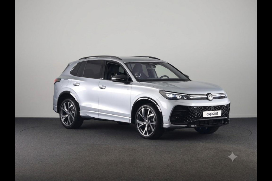 Volkswagen Tiguan 1.5 eHybrid R-Line Edition 204 pk Automaat (DSG) | Verlengde garantie | Navigatie | Trekhaak (wegklapbaar) | Parkeersensoren (Park assist) | Rondomzicht camera | Black Style pakket | R-Line |