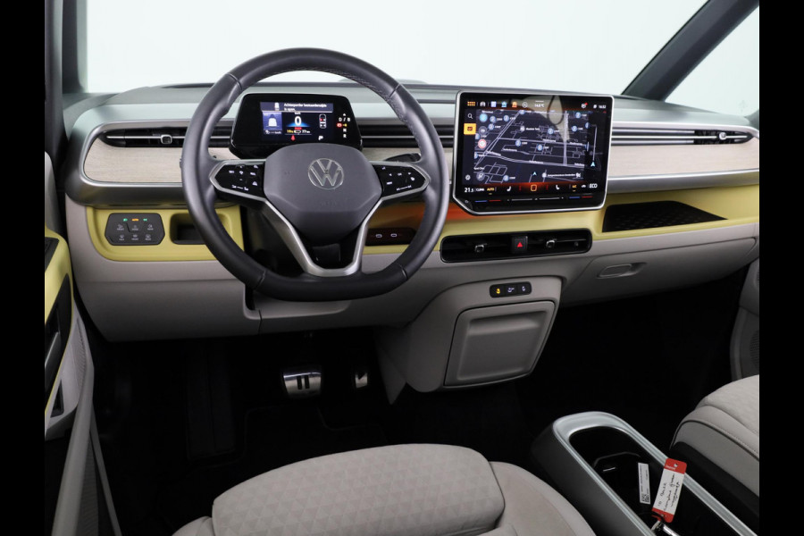 Volkswagen ID. Buzz Pro 86 kWh LWB 7p. 286 pk | SoH 96,36% |Navigatie | Panoramadak | Trekhaak (wegklapbaar) | Parkeersensoren (Park assist) | Rondomzicht camera | Elektr. schuifdeuren | Stoelverwarming |