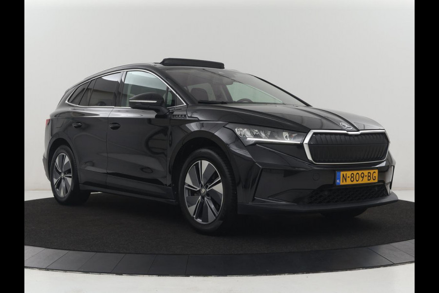 Škoda Enyaq iV 60 | SOH 91.5% | Panoramadak | Adaptive cruise | Stuur/stoel verwarming | Half Leder | Carplay | Park assist | Sfeerverlichting | Climate control |