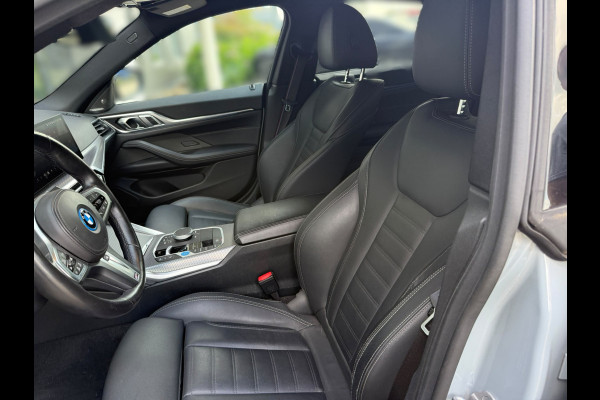 BMW i4 eDrive40 High Executive 84 kWh M Sport | Panoramadak | Stoelverwarming | Stuurverwarming | Harman Kardon | Adaptive Cruise Control | Laser LED | 360 Camera | Keyless | Navigatie | Head-Up Display |  Ambiance Verlichting |