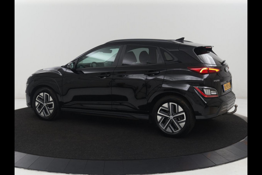 Hyundai Kona EV Premium 64 KWh | SOH 96.2% | Leder | Trekhaak | Head-up | Stoelventilatie | Stuur/stoel verwarming | Adaptive cruise | Camera | Park assist | Carplay | Dodehoek detectie | Krell sound |