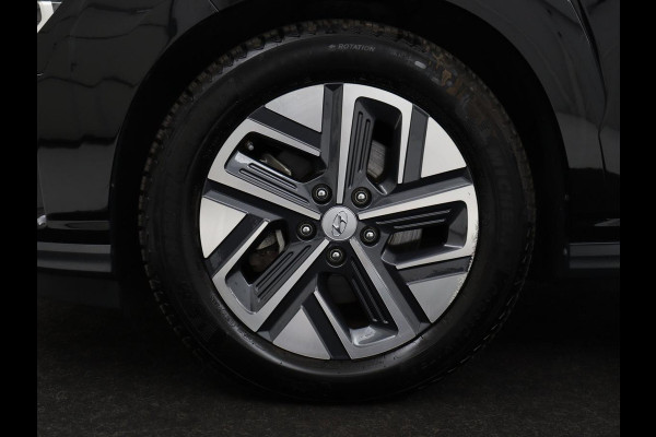 Hyundai Kona EV Premium 64 KWh | SOH 96.2% | Leder | Trekhaak | Head-up | Stoelventilatie | Stuur/stoel verwarming | Adaptive cruise | Camera | Park assist | Carplay | Dodehoek detectie | Krell sound |