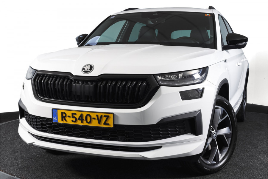 Škoda Kodiaq 1.5 TSI 150 PK Sportline Business Orig. NL | Elek. Trekhaak | Dig. Cockpit | Adapt. Cruise | Stoelverw. | PDC | Camera | NAV + App. Connect | ECC | Elek. Klep | LM 19" |