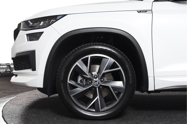 Škoda Kodiaq 1.5 TSI 150 PK Sportline Business Orig. NL | Elek. Trekhaak | Dig. Cockpit | Adapt. Cruise | Stoelverw. | PDC | Camera | NAV + App. Connect | ECC | Elek. Klep | LM 19" |