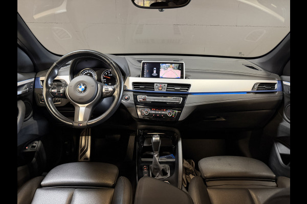 BMW X1 xDrive25e High Executive | M-pakket | Camera | Afn. trekhaak | Leder | Sfeerverlichting | Full LED