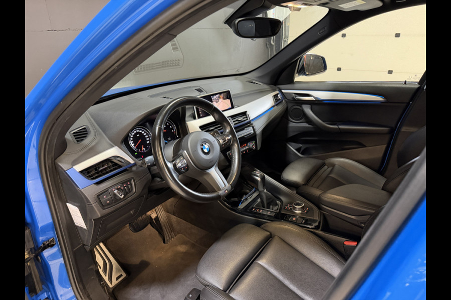BMW X1 xDrive25e High Executive | M-pakket | Camera | Afn. trekhaak | Leder | Sfeerverlichting | Full LED