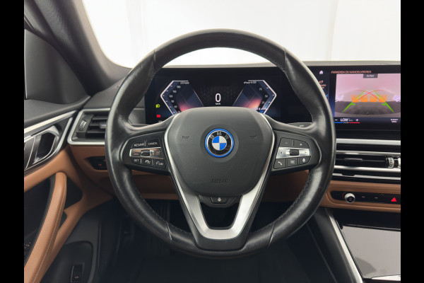 BMW i4 eDrive40 84 kWh [3-Fase] (INCL.BTW) *LEATHER | FULL-LED | ADAPTIVE-CRUISE | HEATED-SPORTSEATS | WIDESCREEN-DIGI-COCKPIT | CAMERA | DAB+ | PRIVACY-GLASS | NAVI-FULLMAP | ECC | PDC | 17''ALU | TOWBAR*