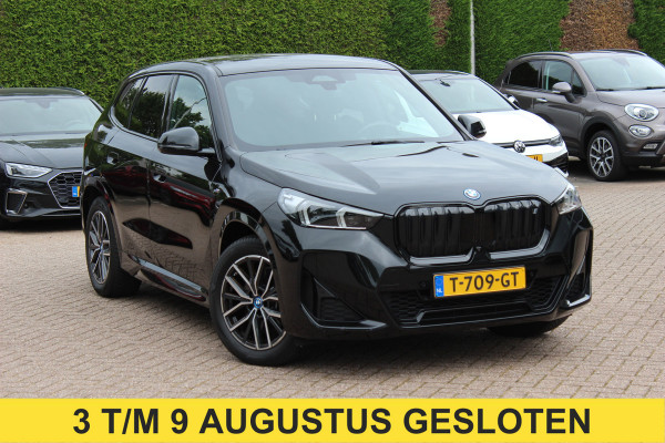 BMW iX1 xDrive30 Launch Edition 67 kWh M Sport / SoH 94% / Trekhaak / 360Camera / Head-up / Leder / CarPlay / 18'' / Keyless / Stoelverwarming / DAB / Cruise Control