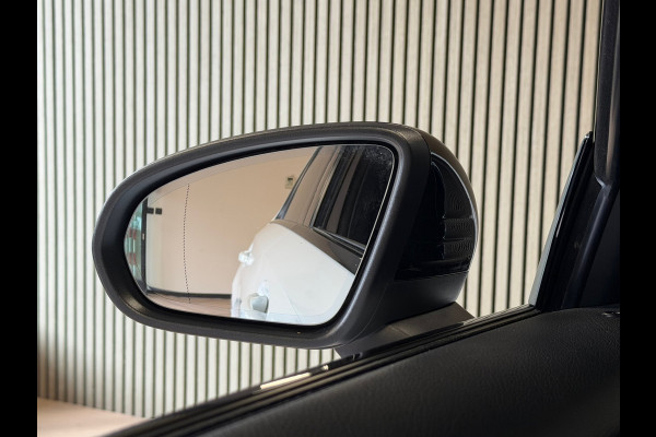 Mercedes-Benz A-Klasse 180 AMG Line AUT. SFEERVERLICHTING CAMERA NAVIGATIE CRUISE PDC KEYLESS-GO STOELVERWARMING AIRCO USB