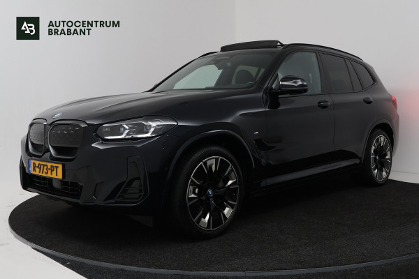 BMW iX3 High Executive 80 kWh (PANORAMADAK, TREKHAAK, H&K AUDIO, CRUISE ADAPTIEF, CAMERA, STOELVERWARMING, SFEERVERLICHTING)