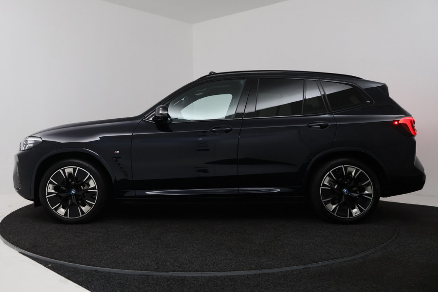 BMW iX3 High Executive 80 kWh (PANORAMADAK, TREKHAAK, H&K AUDIO, CRUISE ADAPTIEF, CAMERA, STOELVERWARMING, SFEERVERLICHTING)