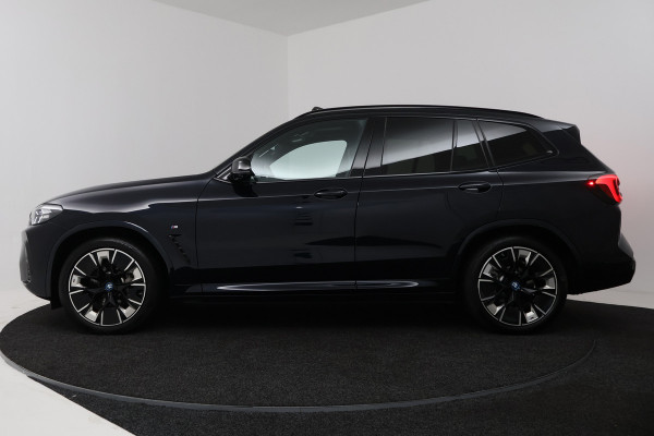 BMW iX3 High Executive 80 kWh (PANORAMADAK, TREKHAAK, H&K AUDIO, CRUISE ADAPTIEF, CAMERA, STOELVERWARMING, SFEERVERLICHTING)