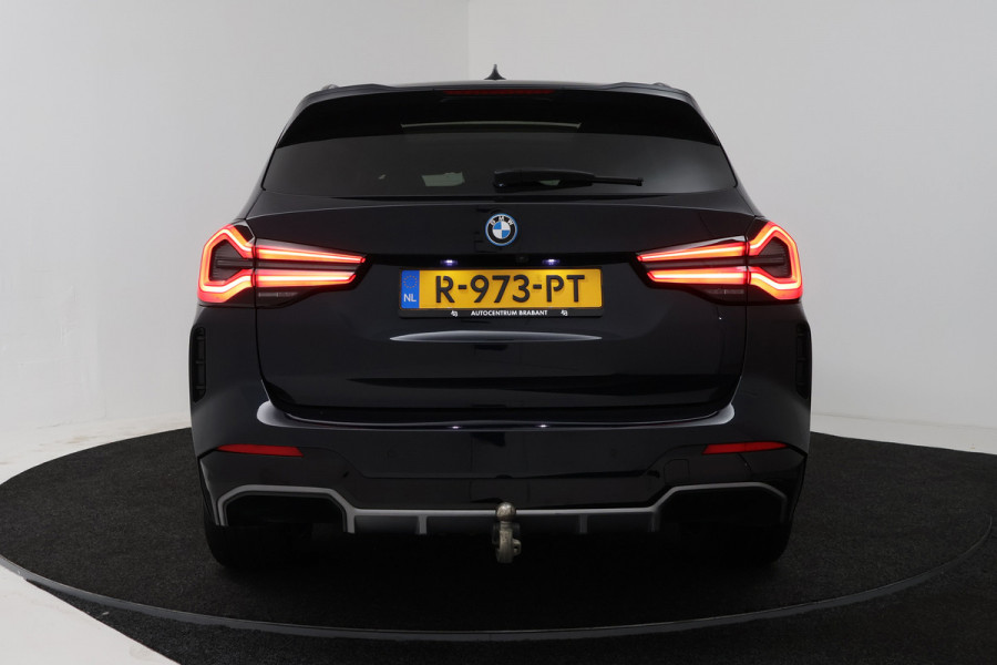 BMW iX3 High Executive 80 kWh (PANORAMADAK, TREKHAAK, H&K AUDIO, CRUISE ADAPTIEF, CAMERA, STOELVERWARMING, SFEERVERLICHTING)