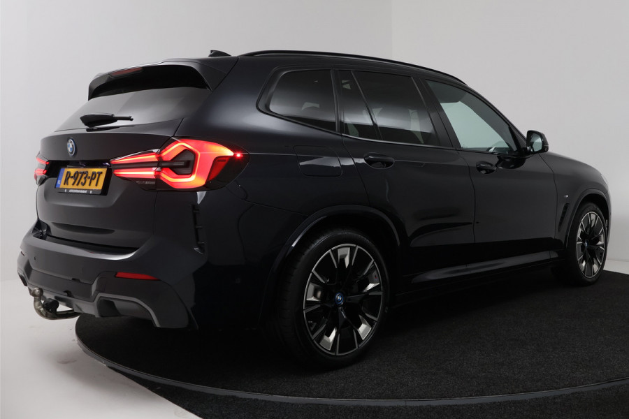 BMW iX3 High Executive 80 kWh (PANORAMADAK, TREKHAAK, H&K AUDIO, CRUISE ADAPTIEF, CAMERA, STOELVERWARMING, SFEERVERLICHTING)