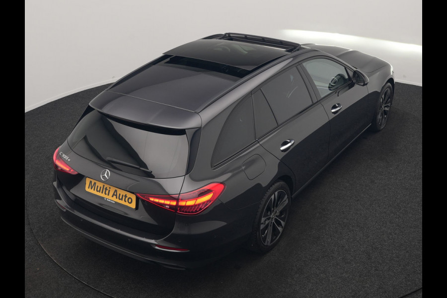 Mercedes-Benz C-Klasse Estate 300 e Avantgarde 313pk Dealer O.H | Trekhaak Af Fabriek | Panodak | Adaptive Cruise | 360 Camera | Digital LED | Lederen Sportstoelen Memory & Ventilatie | Keyless | Apple Carplay | Stoelverwarming | Pilot Assist | Stuurverwarming | Virtual | Sfeerverlichting | Navigatie | DAB | 18"L.M | Plug In Hybrid |