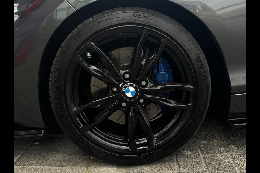 BMW 1-serie M140i xDrive High Executive LCI 2 | Leder | Keyless Entry | Maxton | Stoelverwarming |