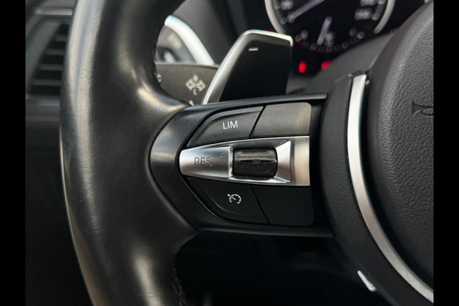 BMW 1-serie M140i xDrive High Executive LCI 2 | Leder | Keyless Entry | Maxton | Stoelverwarming |
