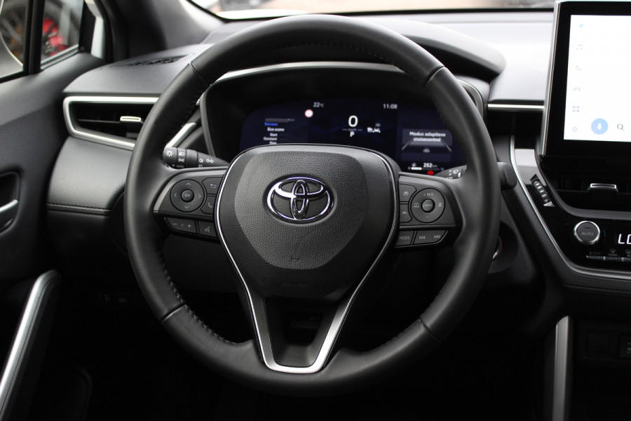 Toyota Corolla Cross 2.0 High Power Hybrid First Edition / 23.304 KM! / Camera / Half leder / CarPlay / Keyless / 18'' / Sfeerverlichting / Stoelverwarming / Dodehoek / DAB / ACC