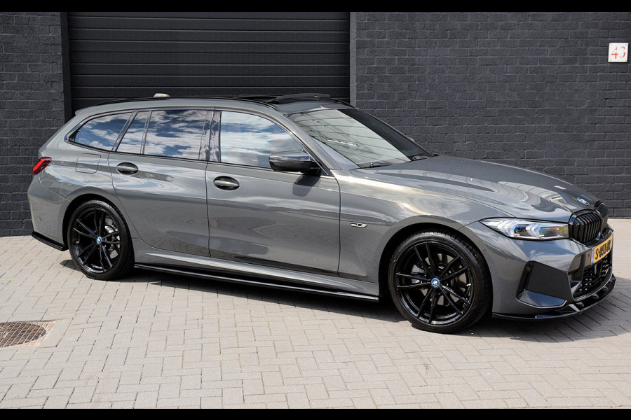 BMW 3 Serie Touring 330e*M-Pakket*Dak*Trekhaak*142Dkm*Keyless*2023*Dravit Grau*INDIVIDUAL*