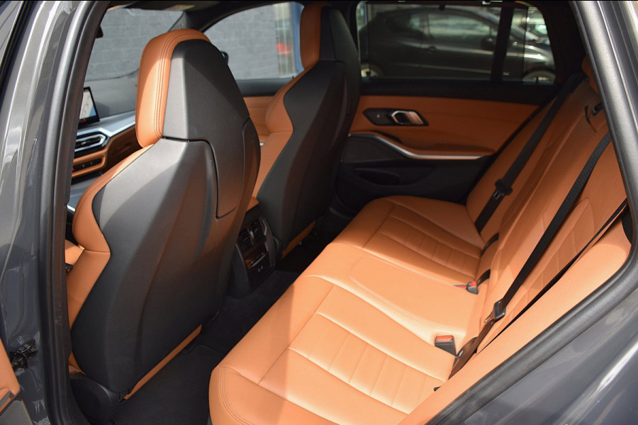 BMW 3 Serie Touring 330e*M-Pakket*Dak*Trekhaak*142Dkm*Keyless*2023*Dravit Grau*INDIVIDUAL*