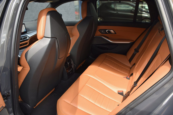 BMW 3 Serie Touring 330e*M-Pakket*Dak*Trekhaak*142Dkm*Keyless*2023*Dravit Grau*INDIVIDUAL*